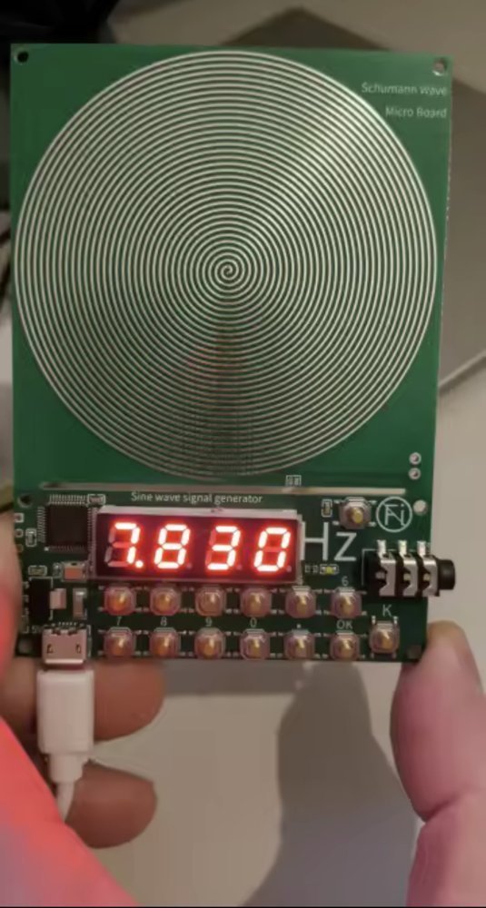 Generator running, showing 7.83 Hz on its LED display